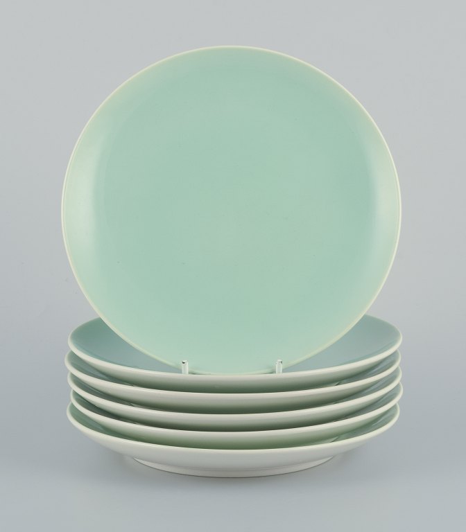 Six Aluminia "Confetti" plates in mint green glazed earthenware.