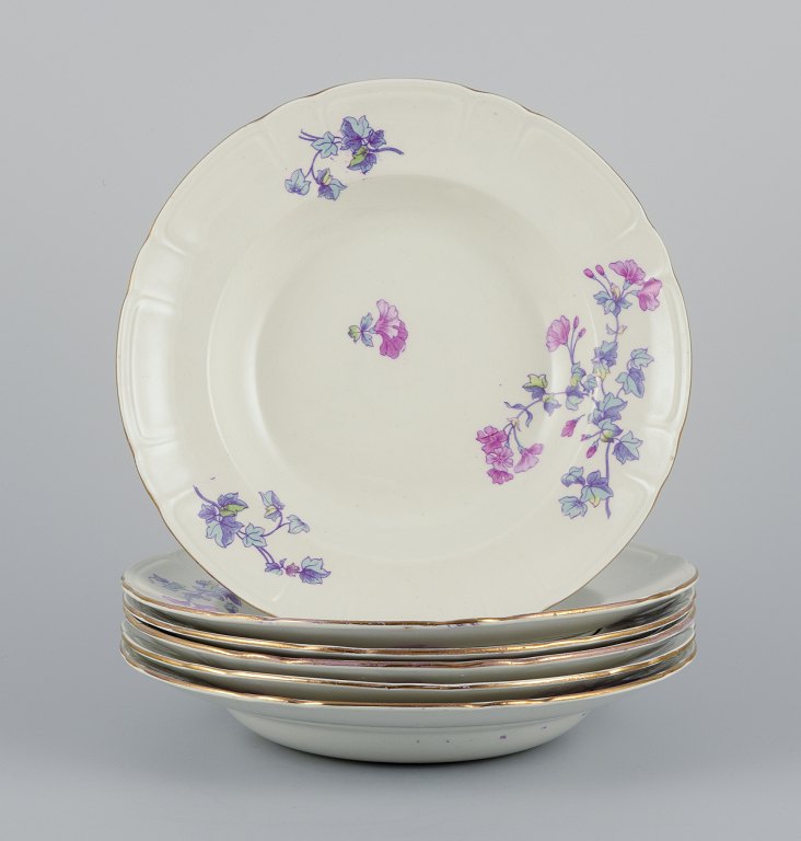 Gustafsberg, Sweden.
A set of six deep ‘Geranium’ earthenware plates.