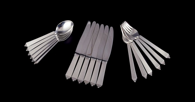 Georg Jensen Pyramid.
Complete six-person lunch service in sterling silver.