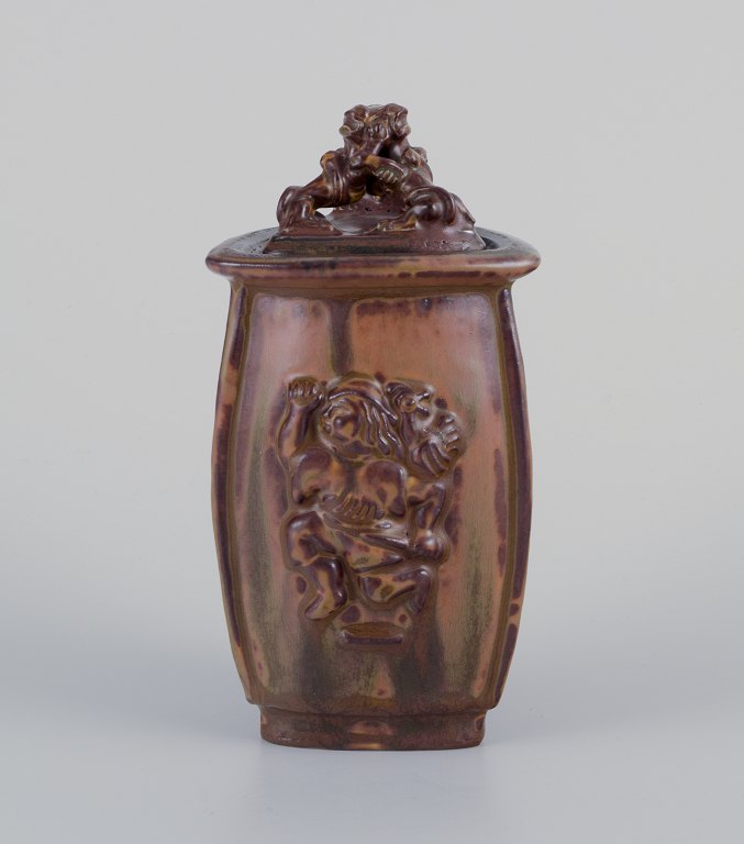 Bode Willumsen for Royal Copenhagen.
Lidded jar made of sung glazed earthenware.