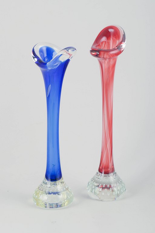 Swedish glass artist
Two vases in colored and clear glass.