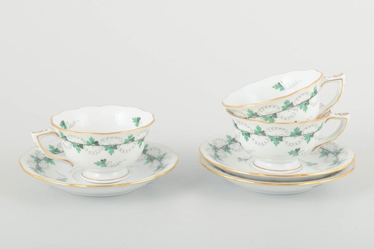 Herend, Hungary
3 demitasse cups with saucers, mid-20th century.