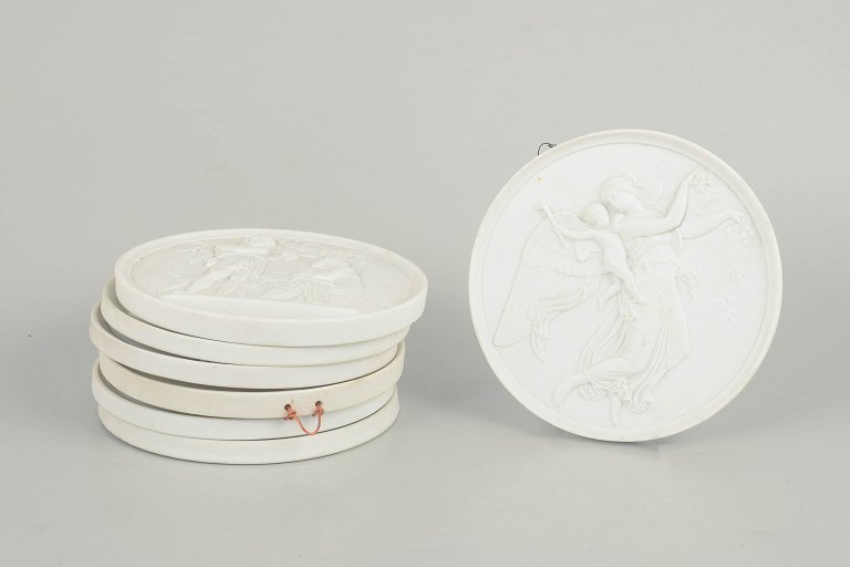 Bing & Grøndahl, set of seven biscuit wall plaques after Thorvaldsen.
