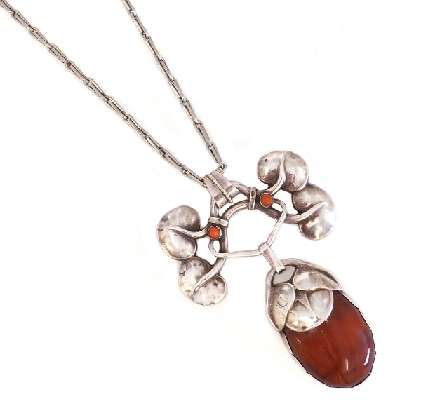 Kay Bojesen pendant, silver and amber. Dated 1915. Size: 7x4,5cm