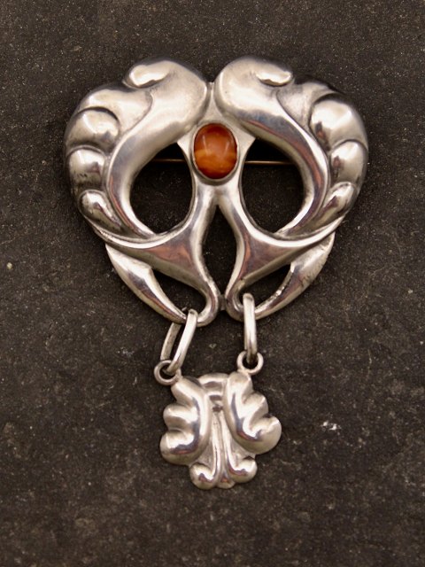 Art Nouveau brooch with amber