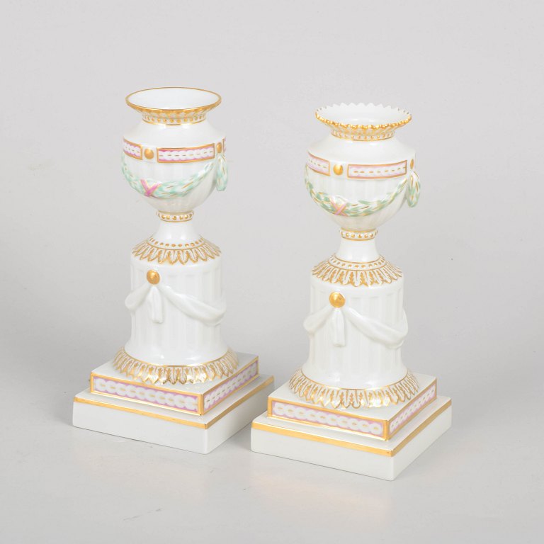 Royal Copenhagen, set of two Flora Danica candlesticks.