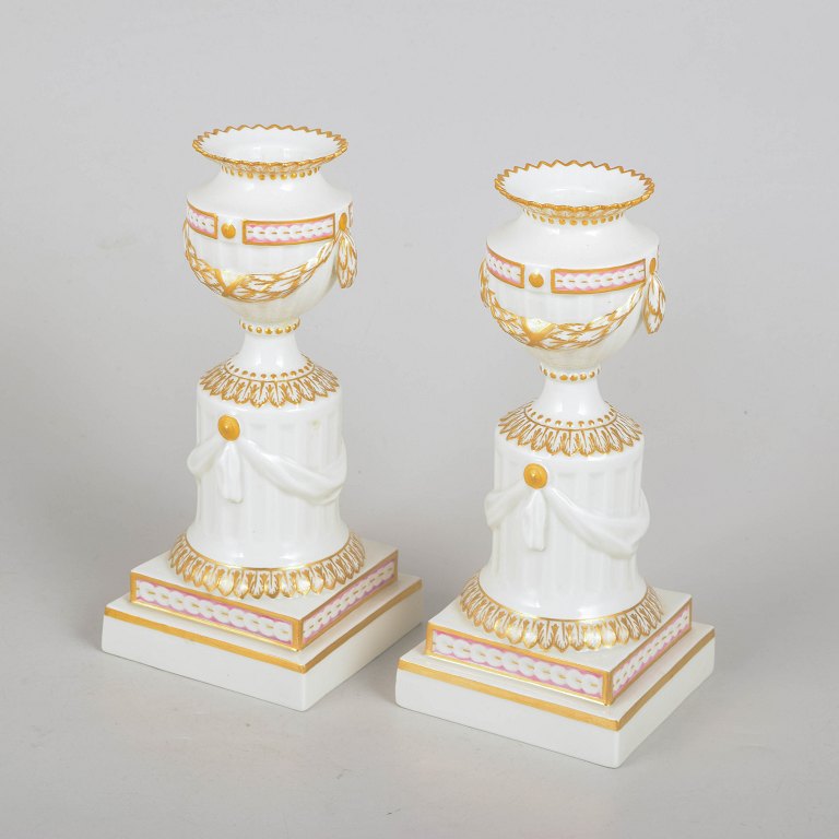 Royal Copenhagen, set of two Flora Danica candlesticks.