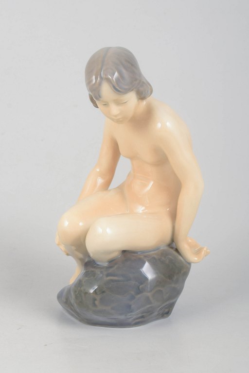 Adda Bonfils for Royal Copenhagen, girl on rock.