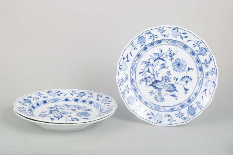 Meissen, set of three Blue Onion dinner plates.